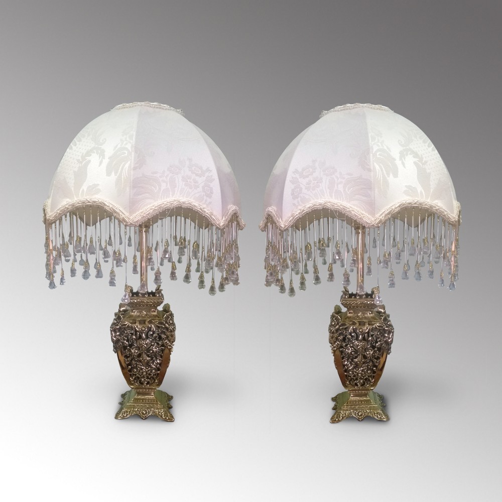 A pair of 19th century brass lamps