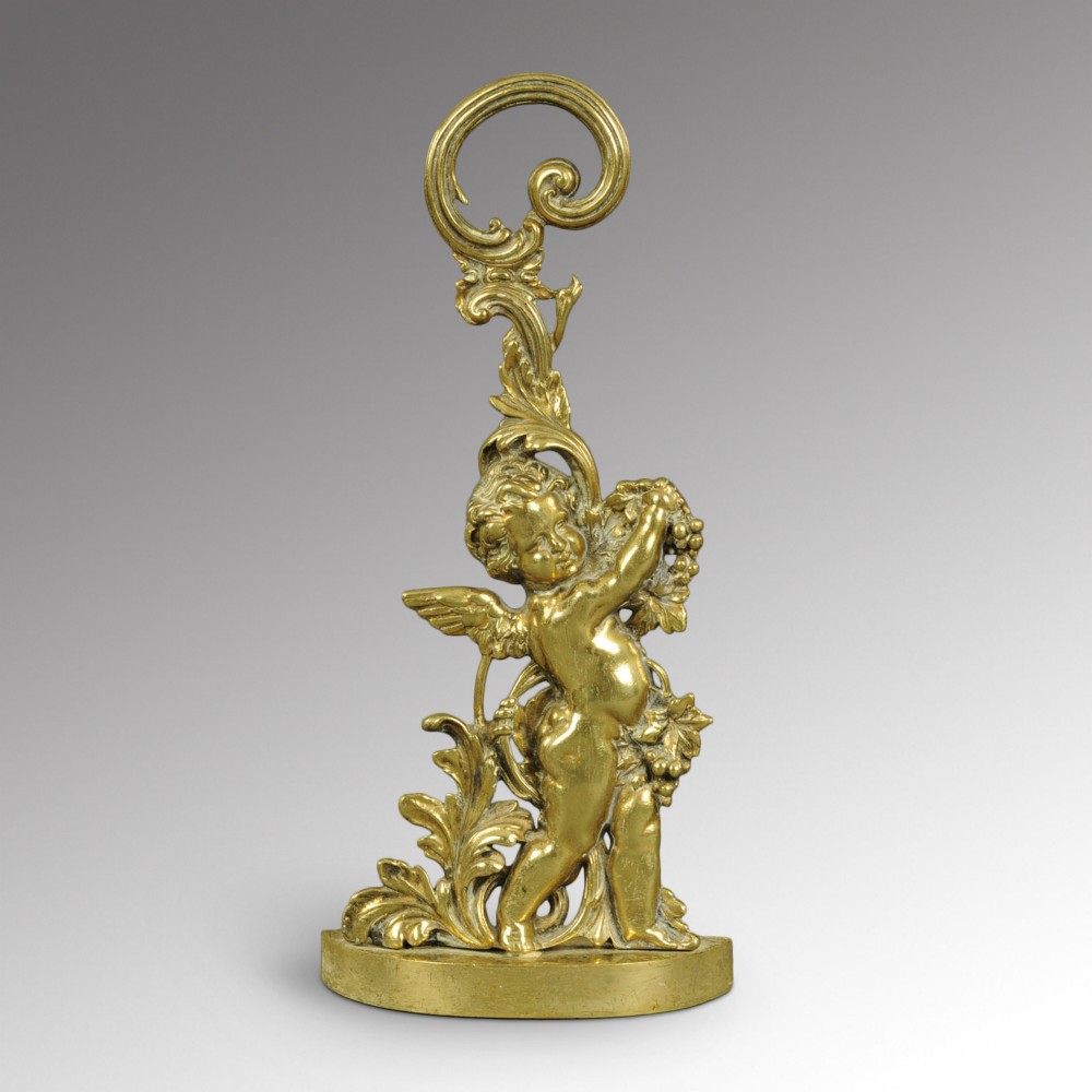 Victorian Brass Doorstop in the form of a Baccanal Cherub