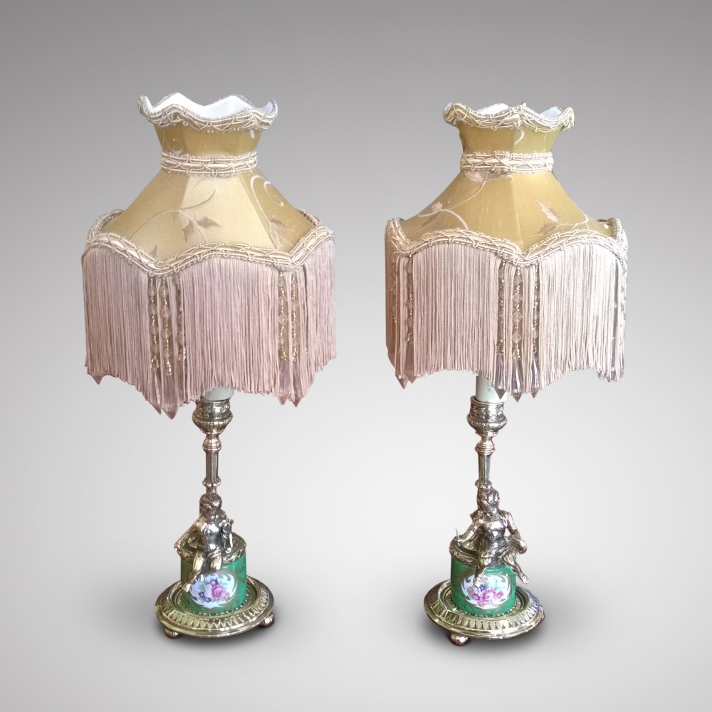 Pair of ormolu and porcelain table lamps