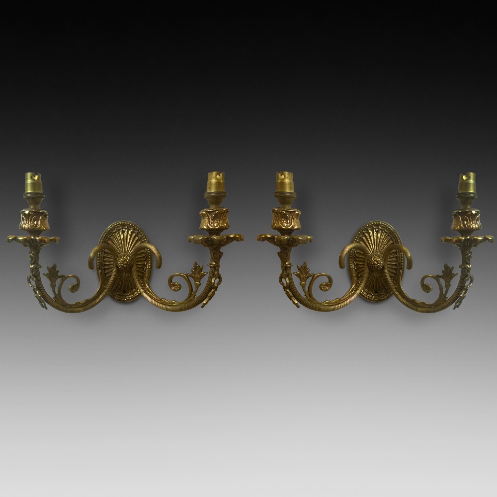 Pair of cast brass wall lights