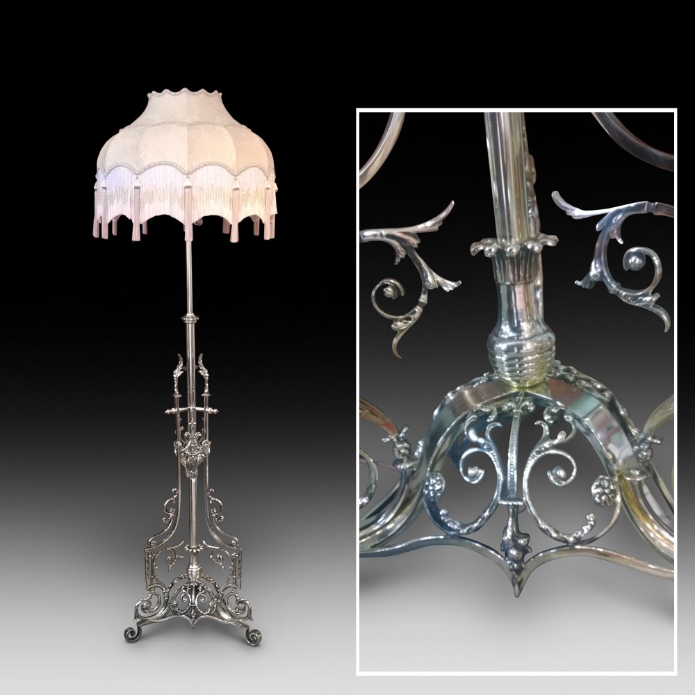 A Victorian brass adjustable lamp standard