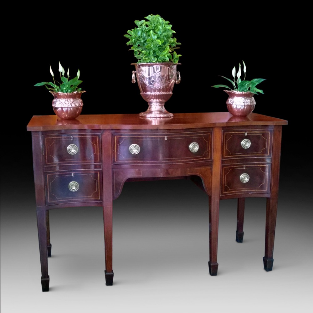 Late Georgian Mahogany Serpentine Sideboard