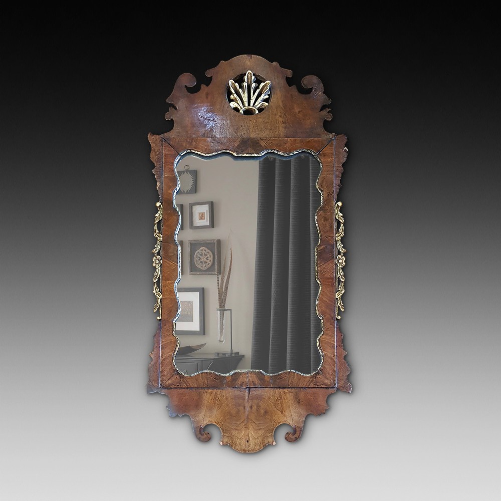 George II Walnut and Parcel Gilt Mirror