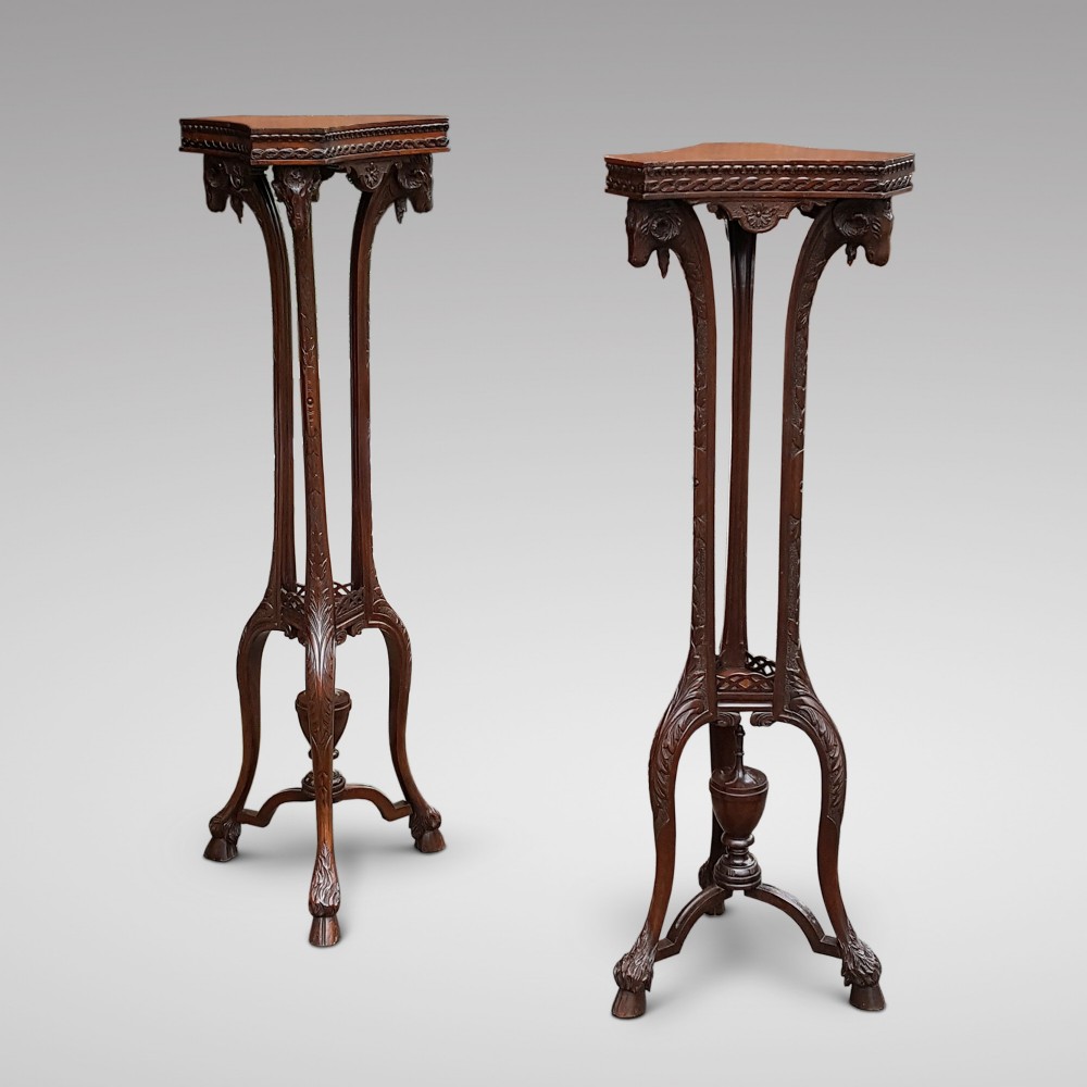 A pair of Late 19thC Carved Mahogany Torcheres in Adam Style