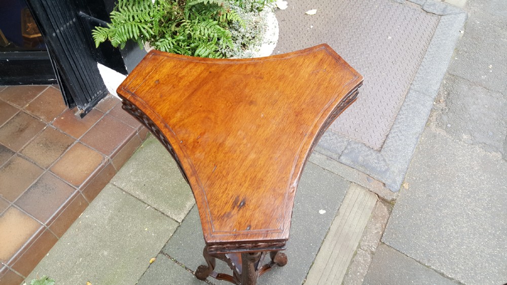 A pair of Late 19thC Carved Mahogany Torcheres in Adam Style View II