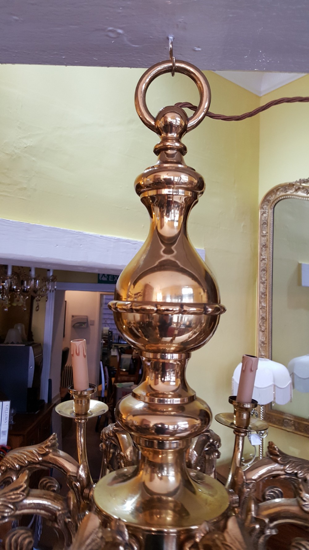A large brass eight branch chandelier View II