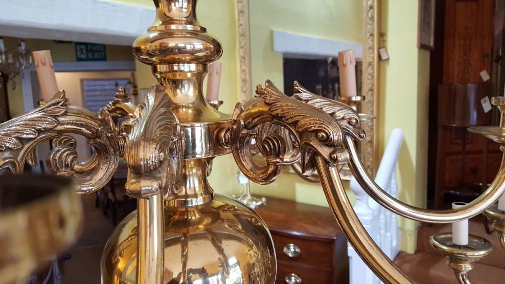 A large brass eight branch chandelier View IV