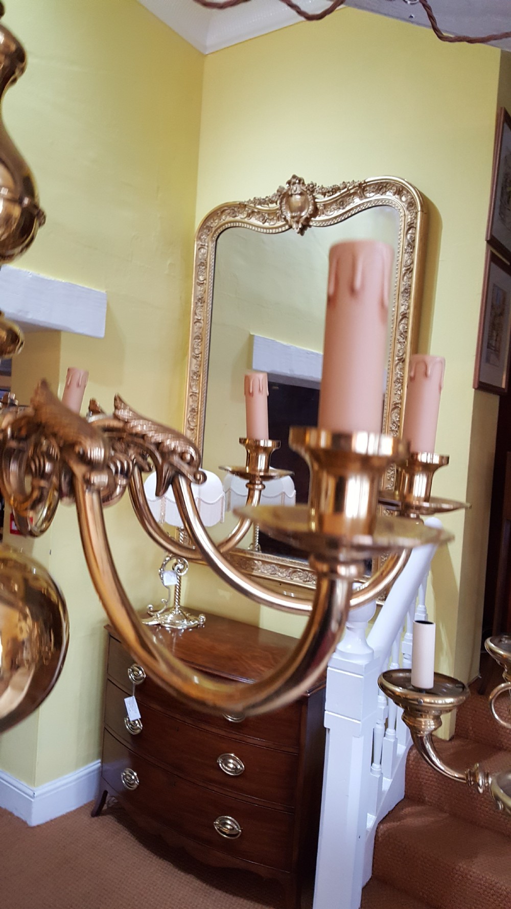 A large brass eight branch chandelier View V
