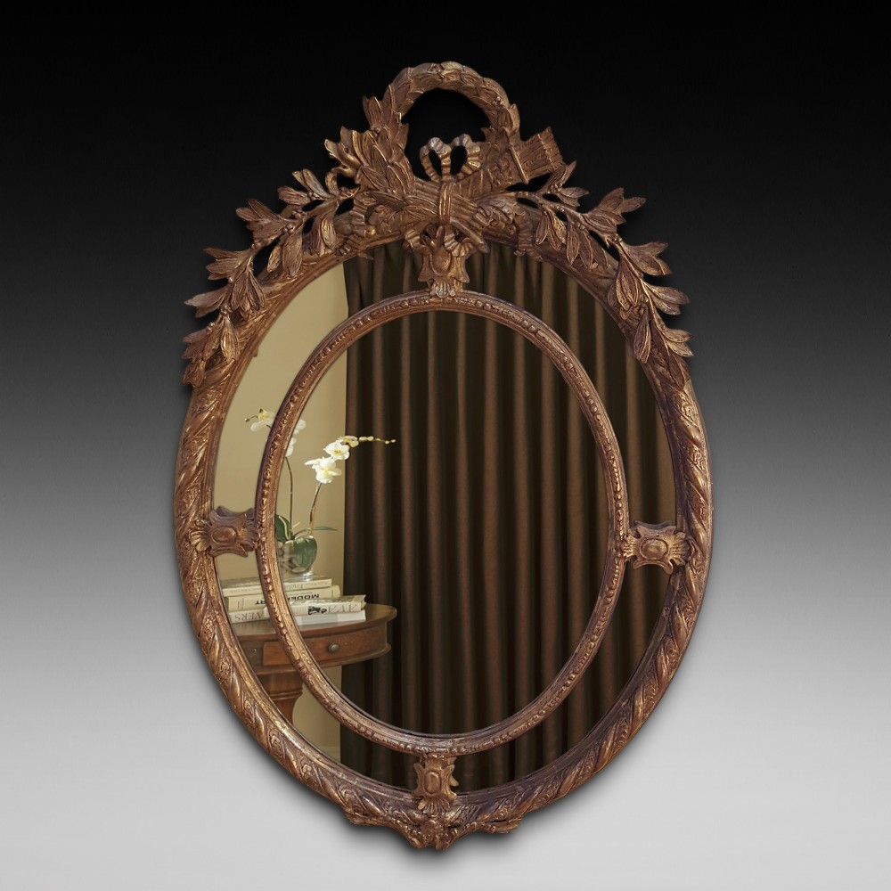 Victorian gilt wood oval wall mirror 