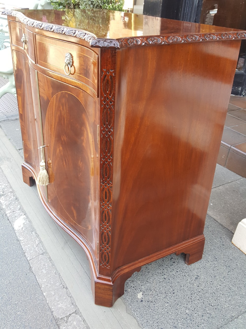 George III style serpentine mahogany drinks cabinet View VII