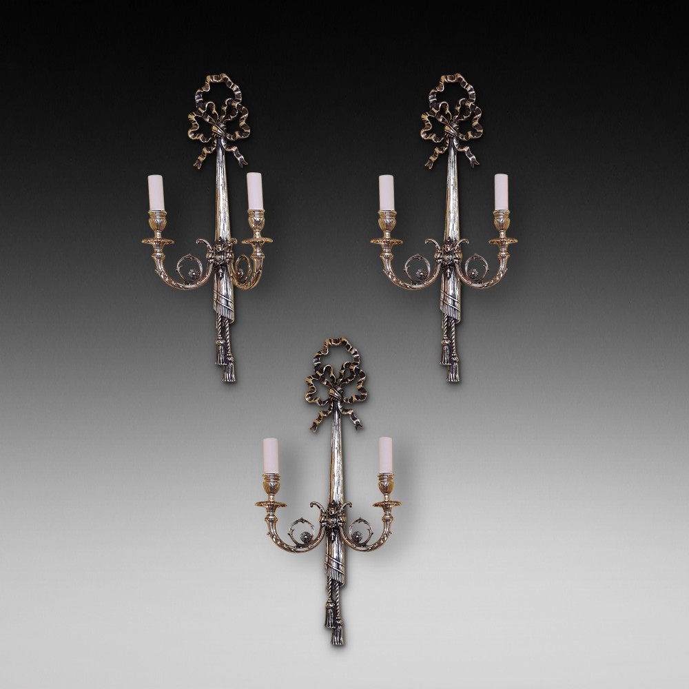 Three Brass Wall Lights of Neoclassical Form