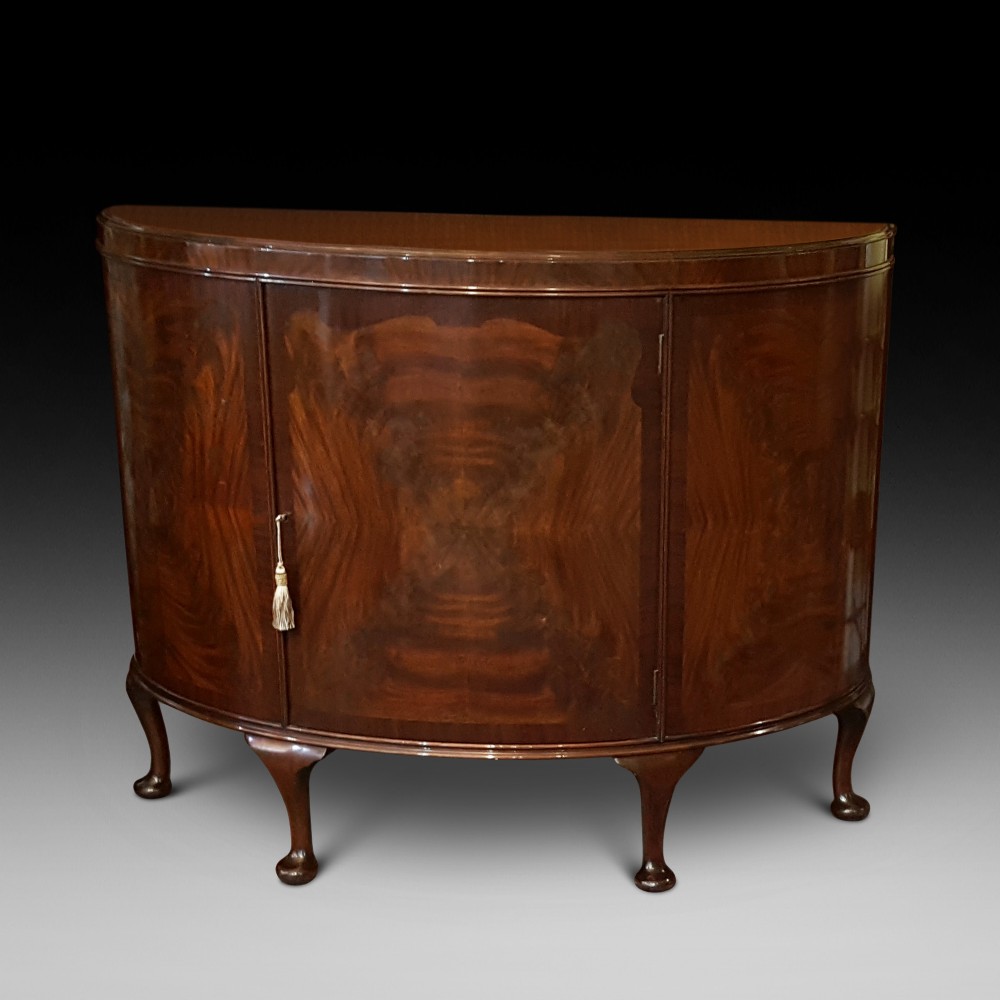 Mahogany bow front drinks cabinet