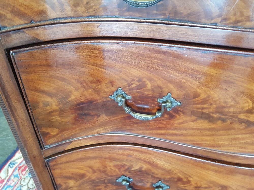 George III Mahogany Serpentine Chest of Drawers View II