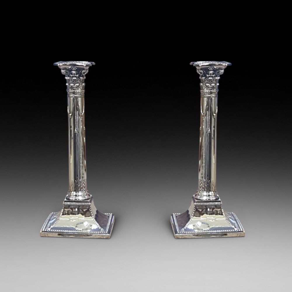 Pair of early 19thC plated Corinthian column candlesticks