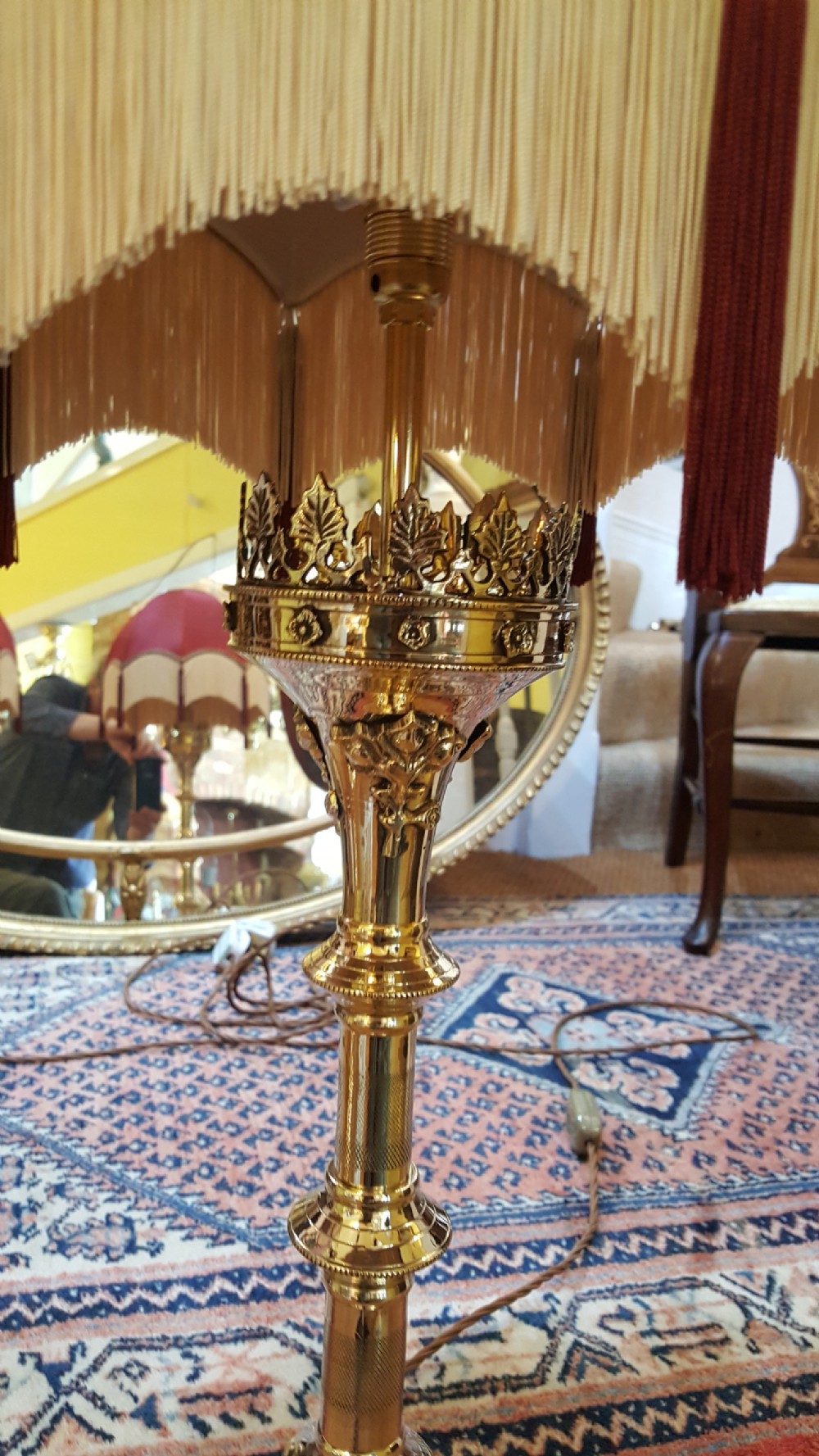 A pair of early 20thC brass candlesticks View IV