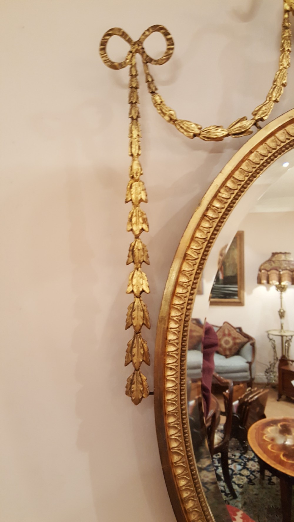 Pair of Edwardian Adam Revival carved gilt wood and gesso wall mirrors View V