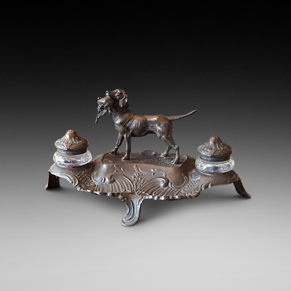 Spelter ink stand centred with a gun dog