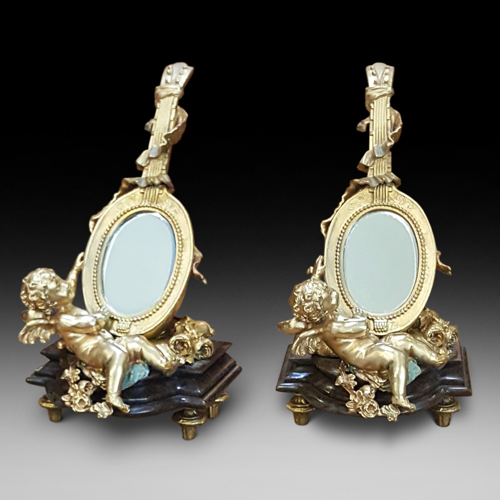 Pair of gilt bronze and marble table mirrors