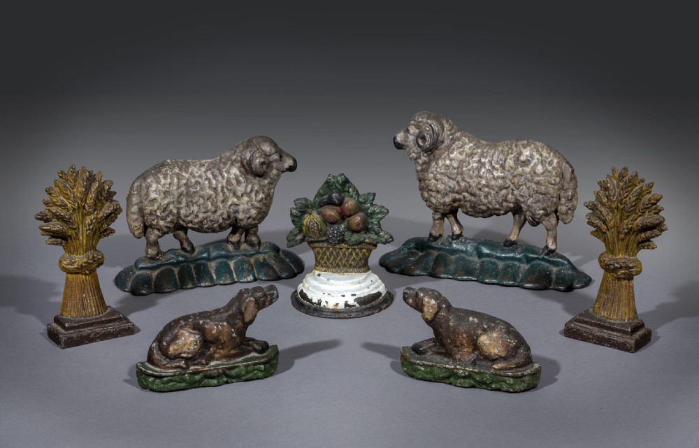 An Ensemble of  7Cast Iron Door Stops