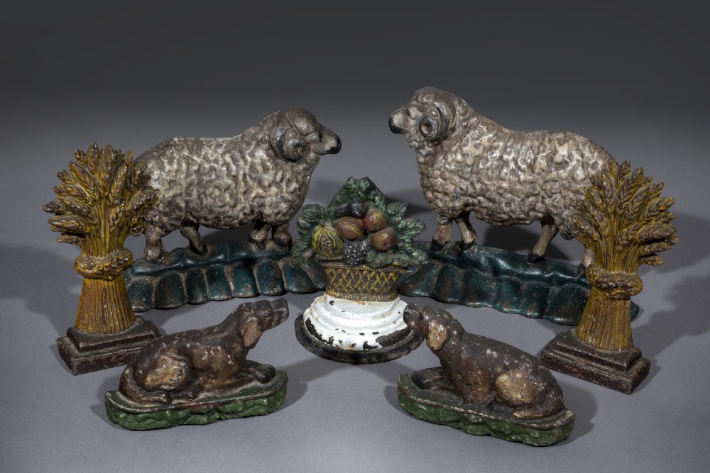 An Ensemble of  7Cast Iron Door Stops View II
