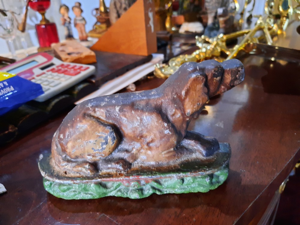 An Ensemble of  7Cast Iron Door Stops View IV