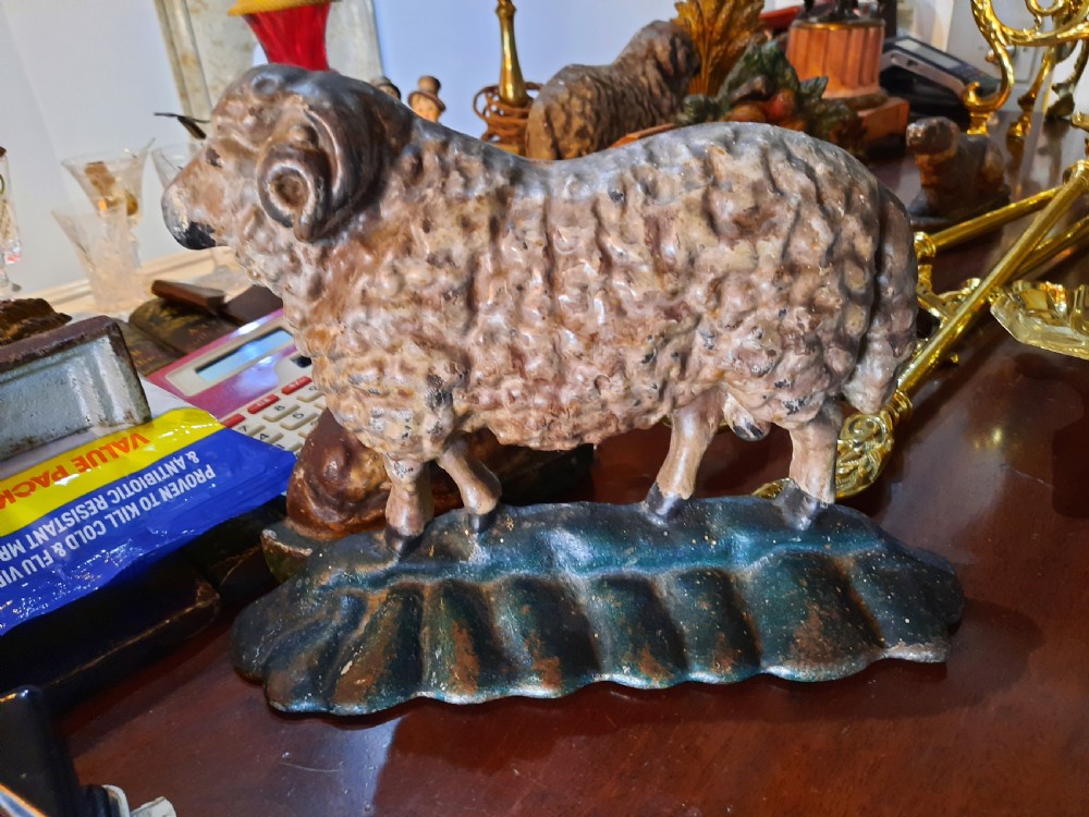 An Ensemble of  7Cast Iron Door Stops View V