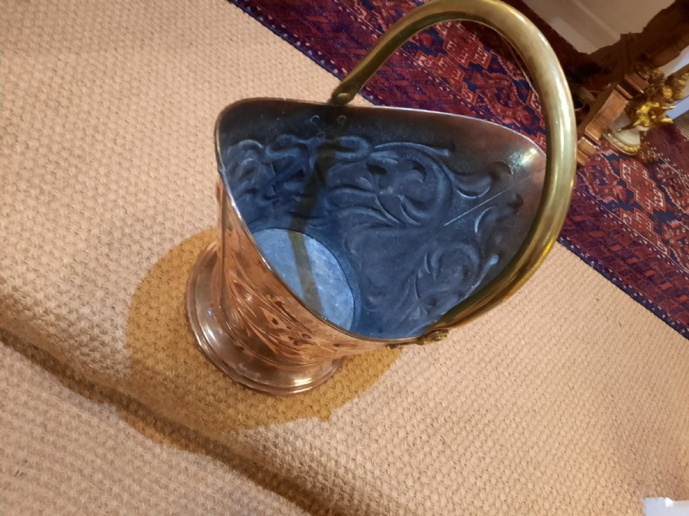Art Nouveau embossed copper coal helmet View III