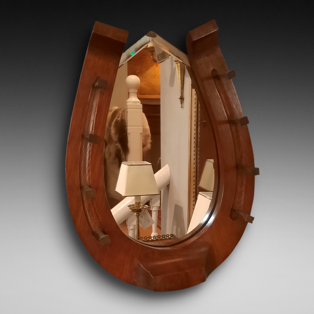 Edwardian walnut horseshoe shaped hall mirror