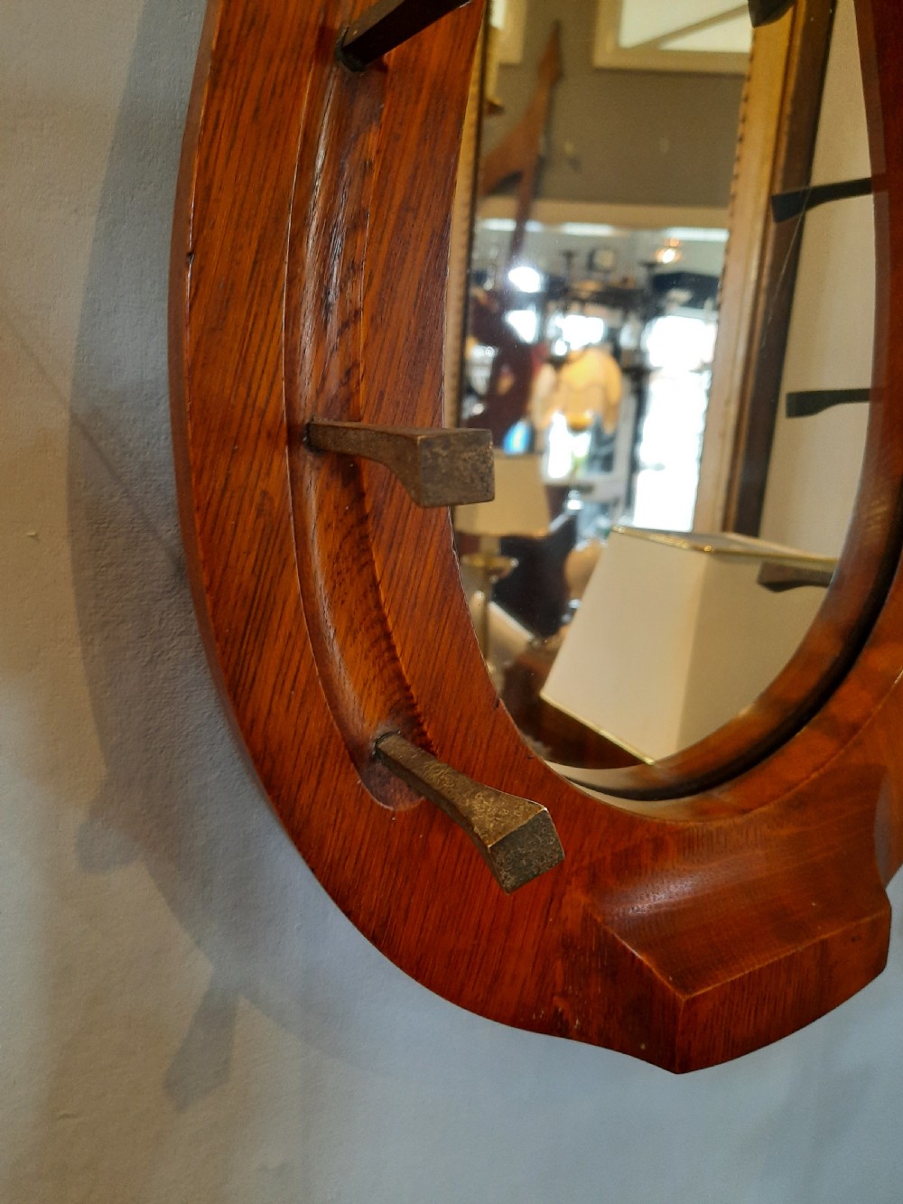 Edwardian walnut horseshoe shaped hall mirror View III