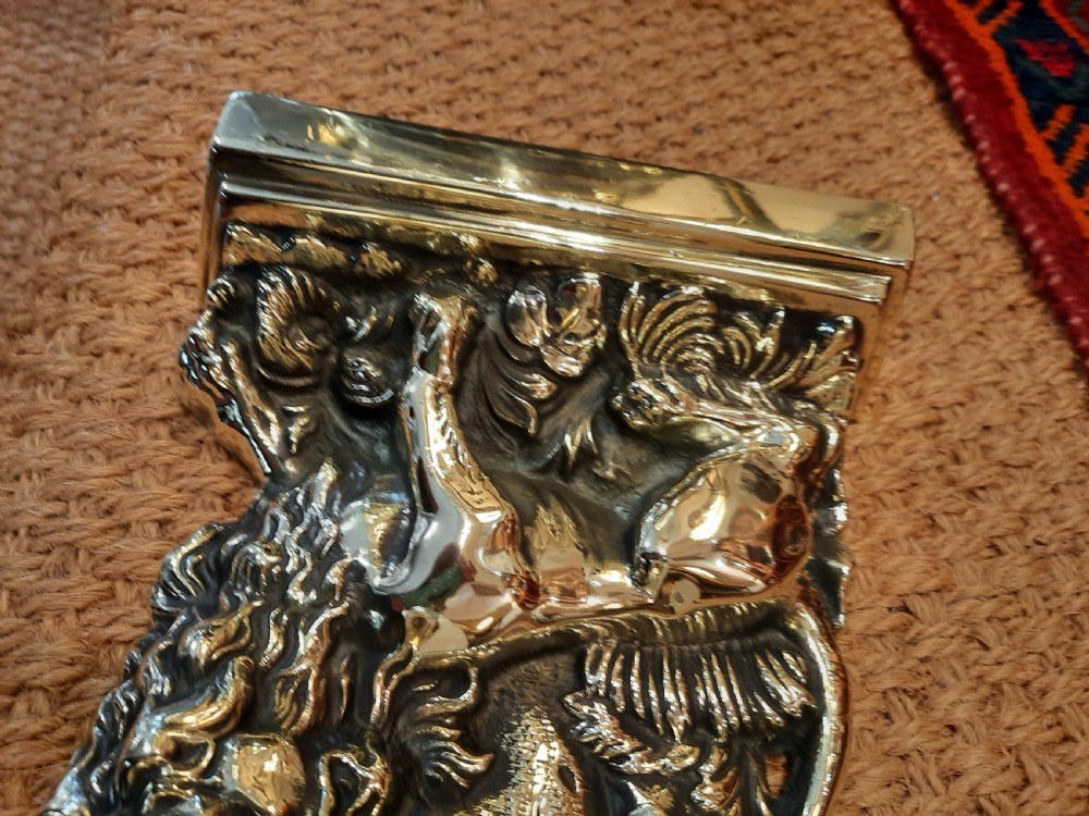 1920’s cast brass door porter depicting a lion and serpent View IV