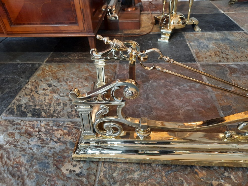 Art Nouveau brass fender and irons View III