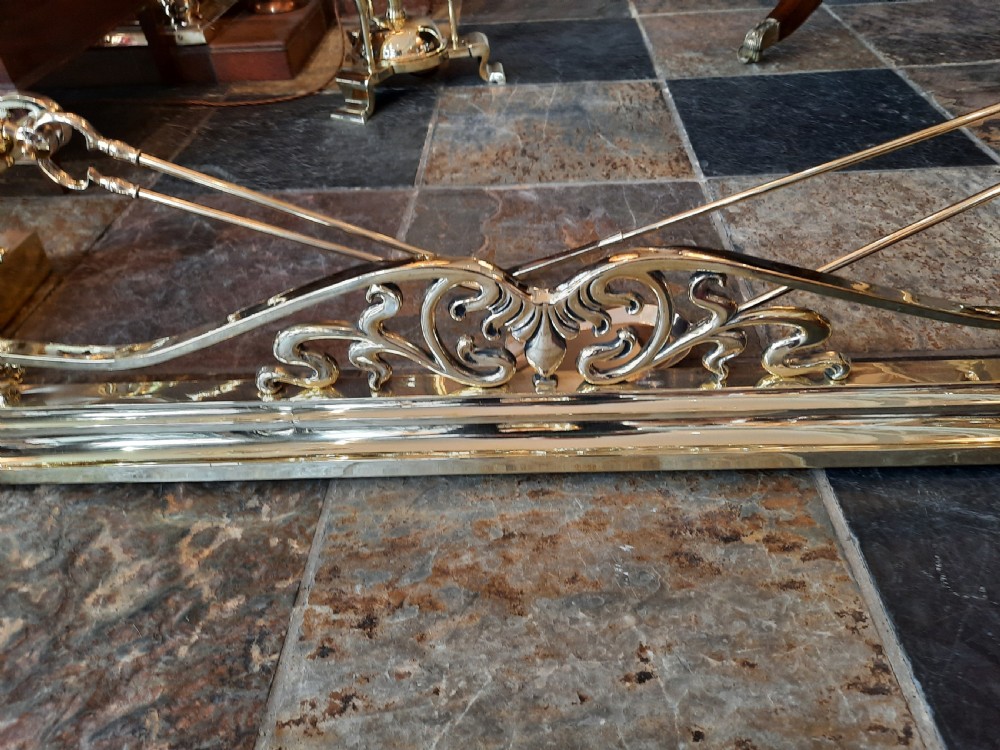 Art Nouveau brass fender and irons View IV