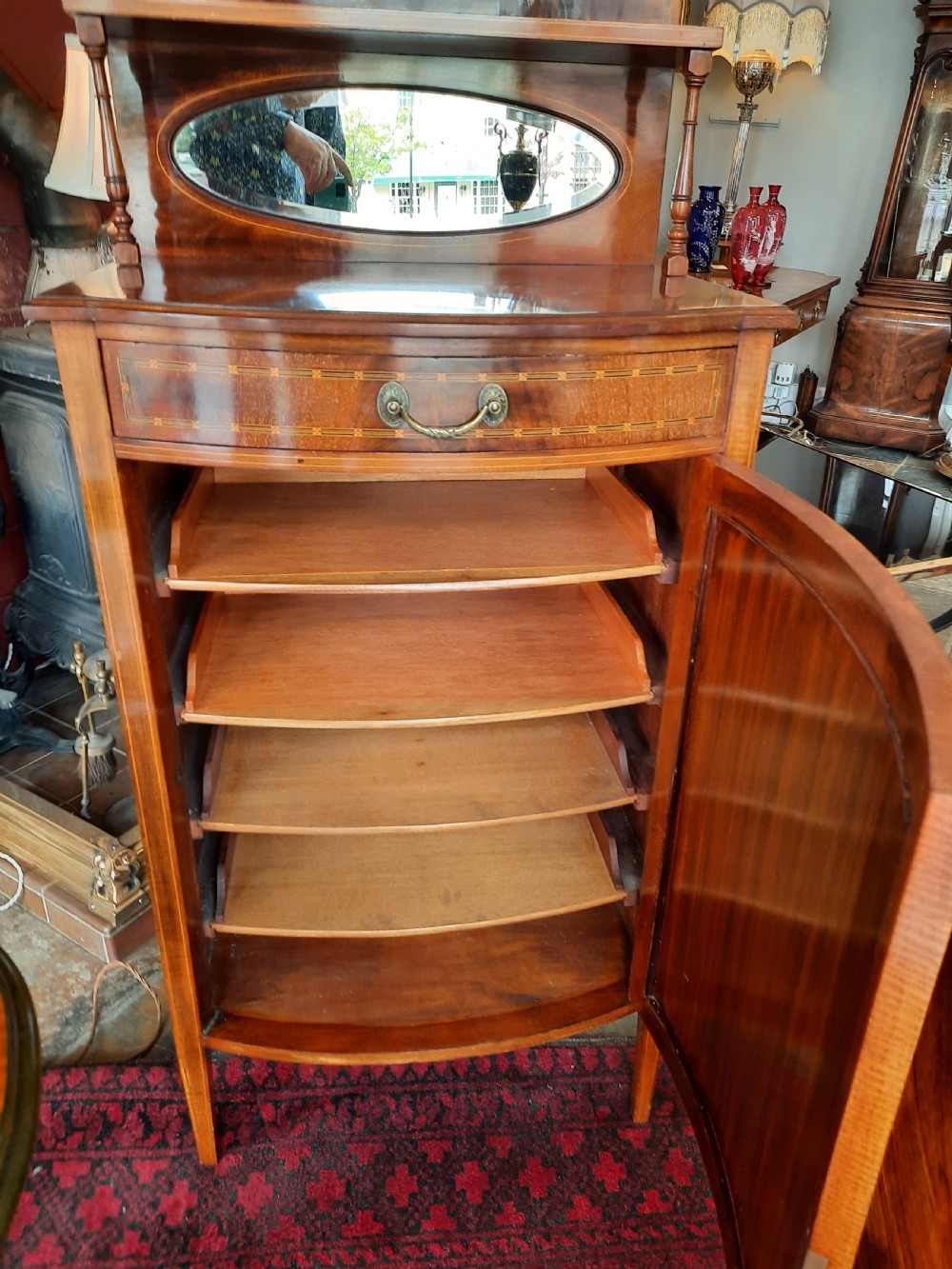 Edwardian mahogany and inlaid bow front music cabinet View II