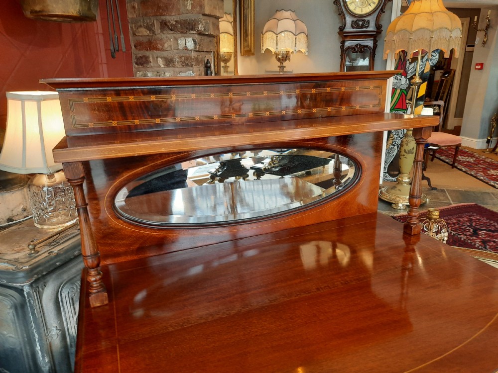 Edwardian mahogany and inlaid bow front music cabinet View IV
