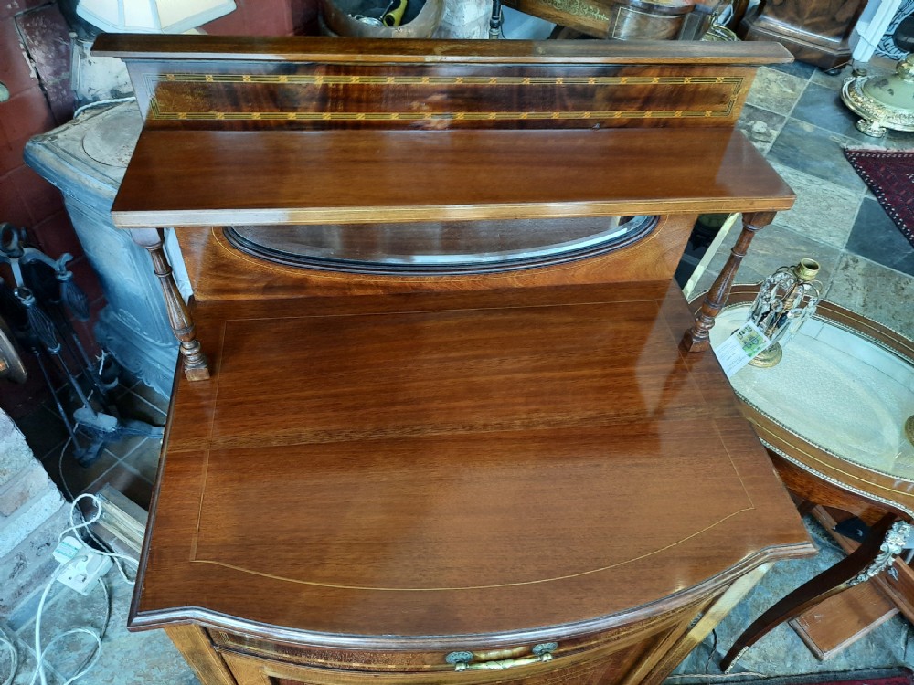 Edwardian mahogany and inlaid bow front music cabinet View V