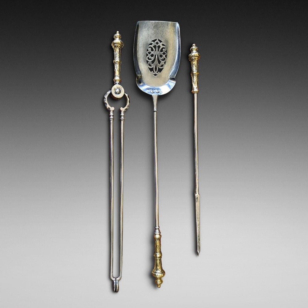 Three George III Steel and Brass Fire Irons