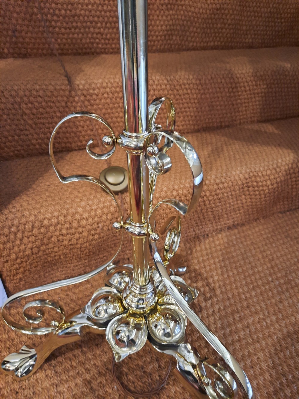 An Arts and Crafts style brass standard lamp featuring a scrolled tripod base, adjustable telescopic shaft, and a domed blue fabric shade with tassel fringe. View III