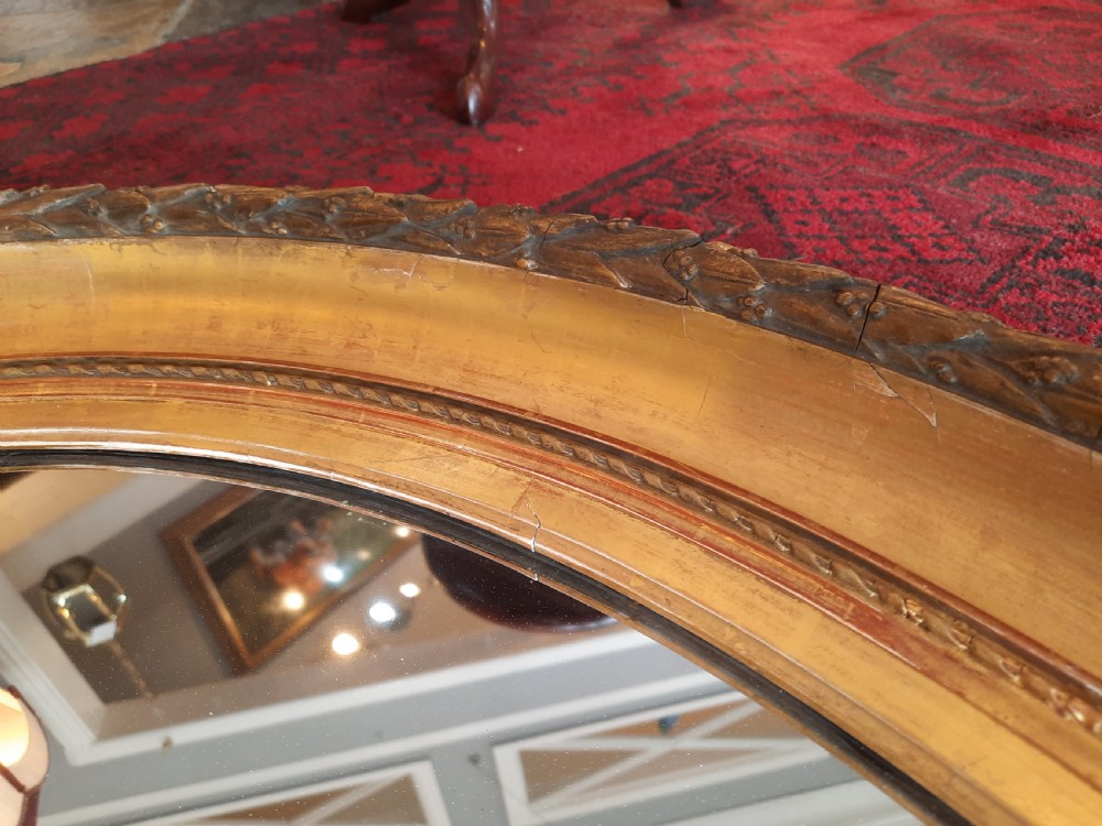 Victorian oval giltwood and gesso wall mirror View VI