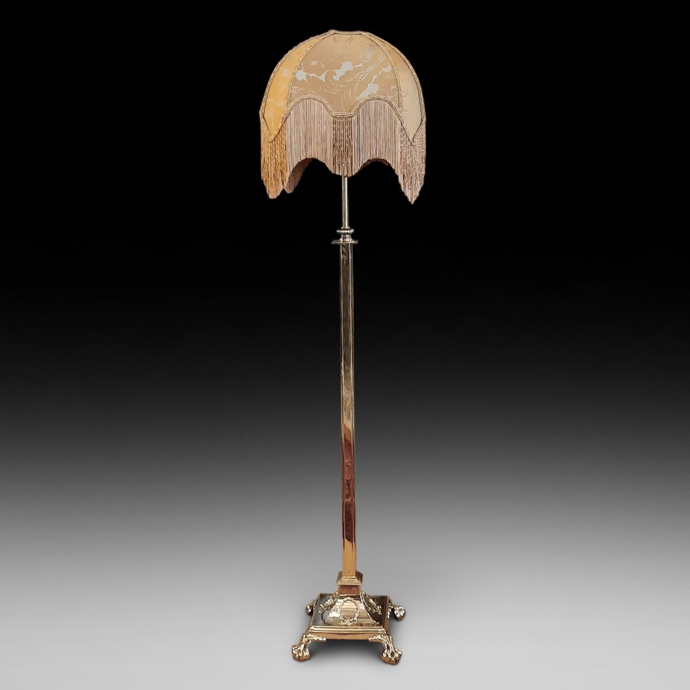 Edwardian Adam style brass adjustable standard lamp