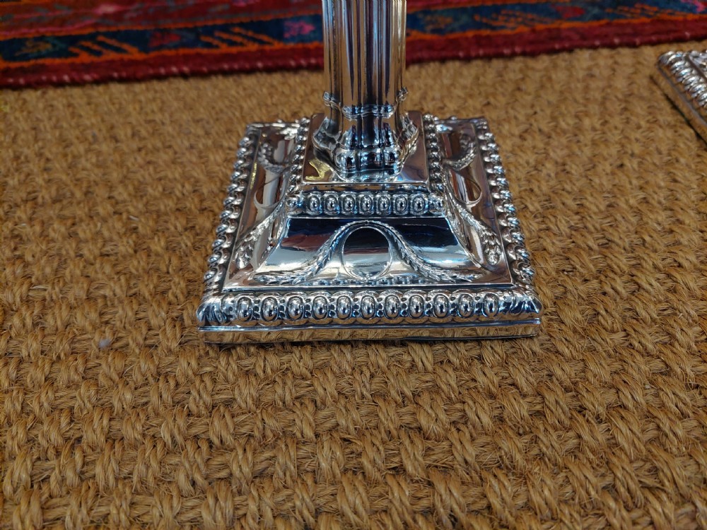 Pair of Edwardian Adam Revival Silver-Plated Candlesticks View II