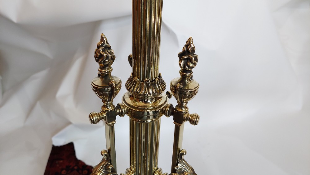 An ornate Victorian brass adjustable standard lamp featuring a scrolled tripod base with paw feet and a fabric shade with fringed tassels. View IX