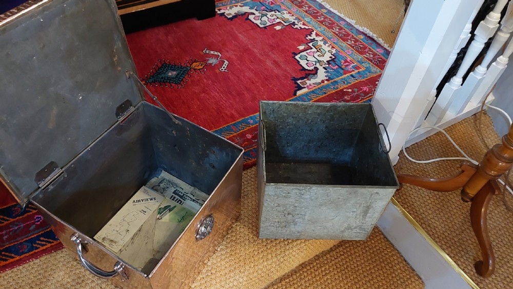 A late 19th-century square copper-plated coal box featuring a hammered finish, hinged lid, drop side handles, and decorative metal studs along the base. View VII