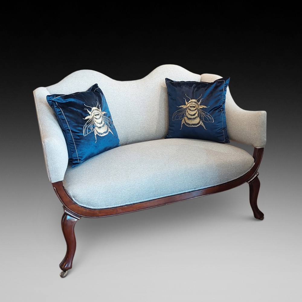 Late Victorian Upholstered Mahogany Camel Back Settee