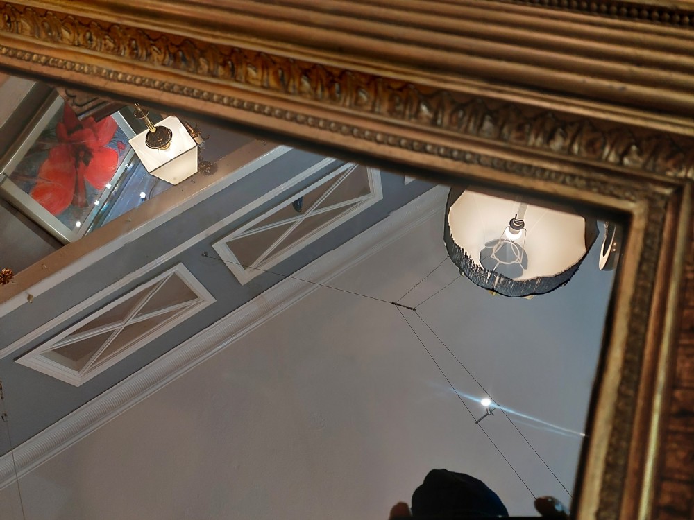 A rectangular Victorian wall mirror featuring a deep giltwood and gesso frame with ribbed moulding and beaded inner borders. View IV