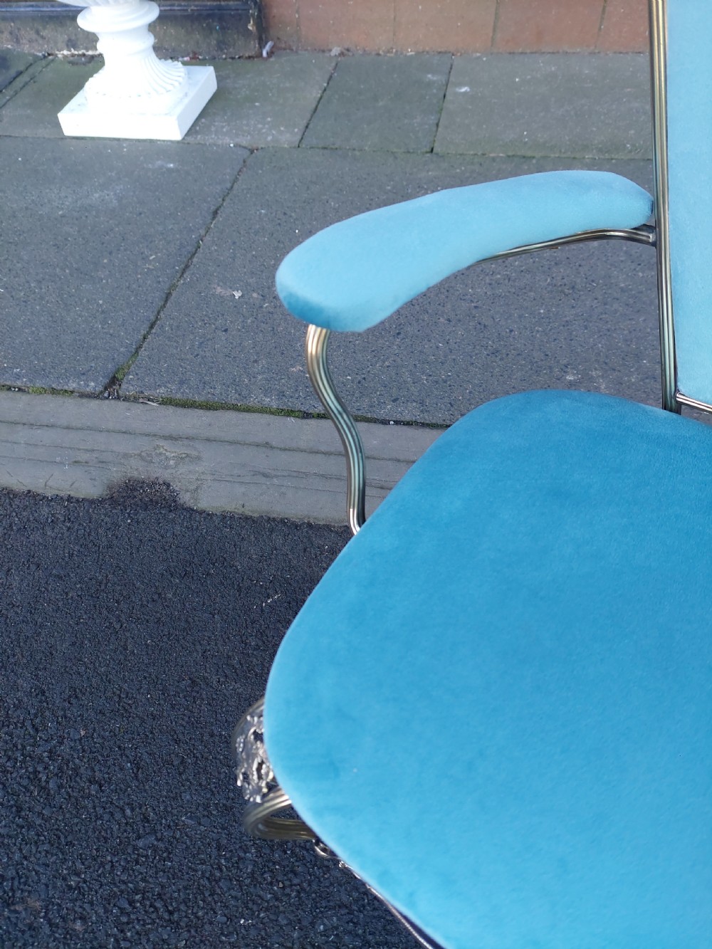 A 1920s miniature metal-framed armchair with turquoise blue velvet upholstery and a fan-shaped backrest. View VI