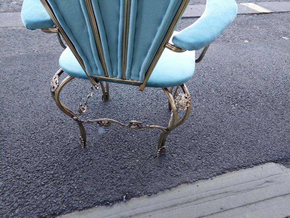 A 1920s miniature metal-framed armchair with turquoise blue velvet upholstery and a fan-shaped backrest. View IX