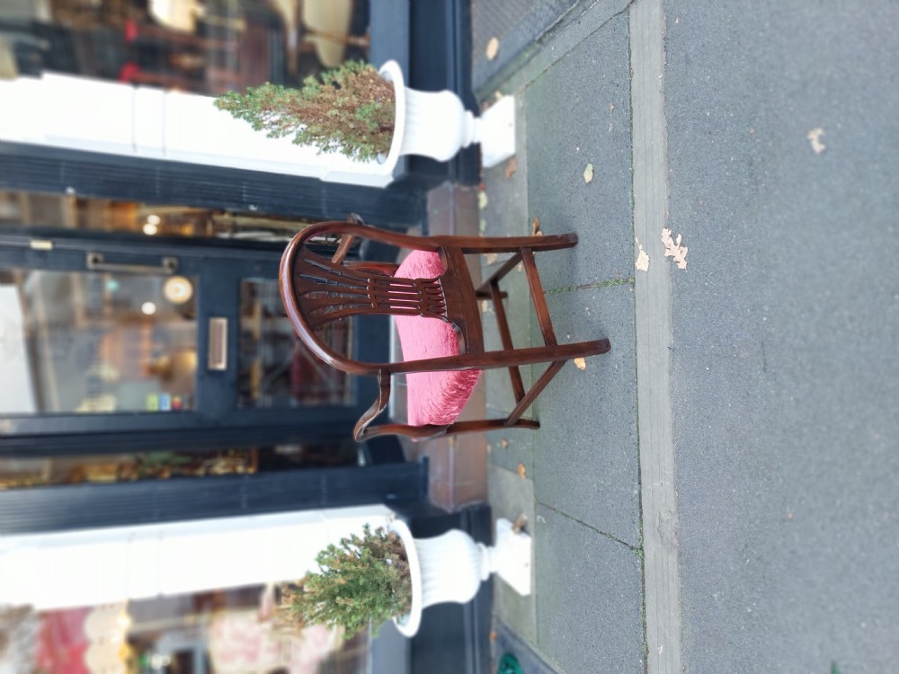 A late 19th-century Hepplewhite style mahogany armchair featuring a carved wheat sheaf oval backrest, curved arms, and a red velvet upholstered seat. View XI