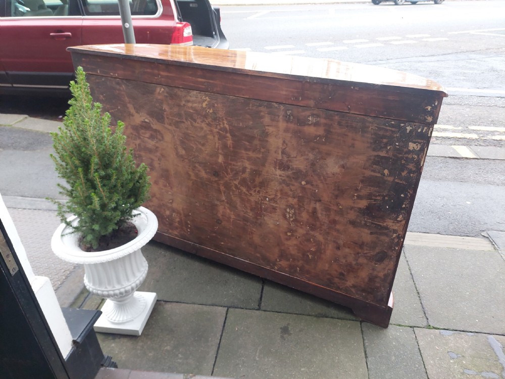 A Victorian burr walnut bow-fronted credenza featuring central inlaid wooden doors flanked by curved glazed display sections with ormolu mounts. View VII