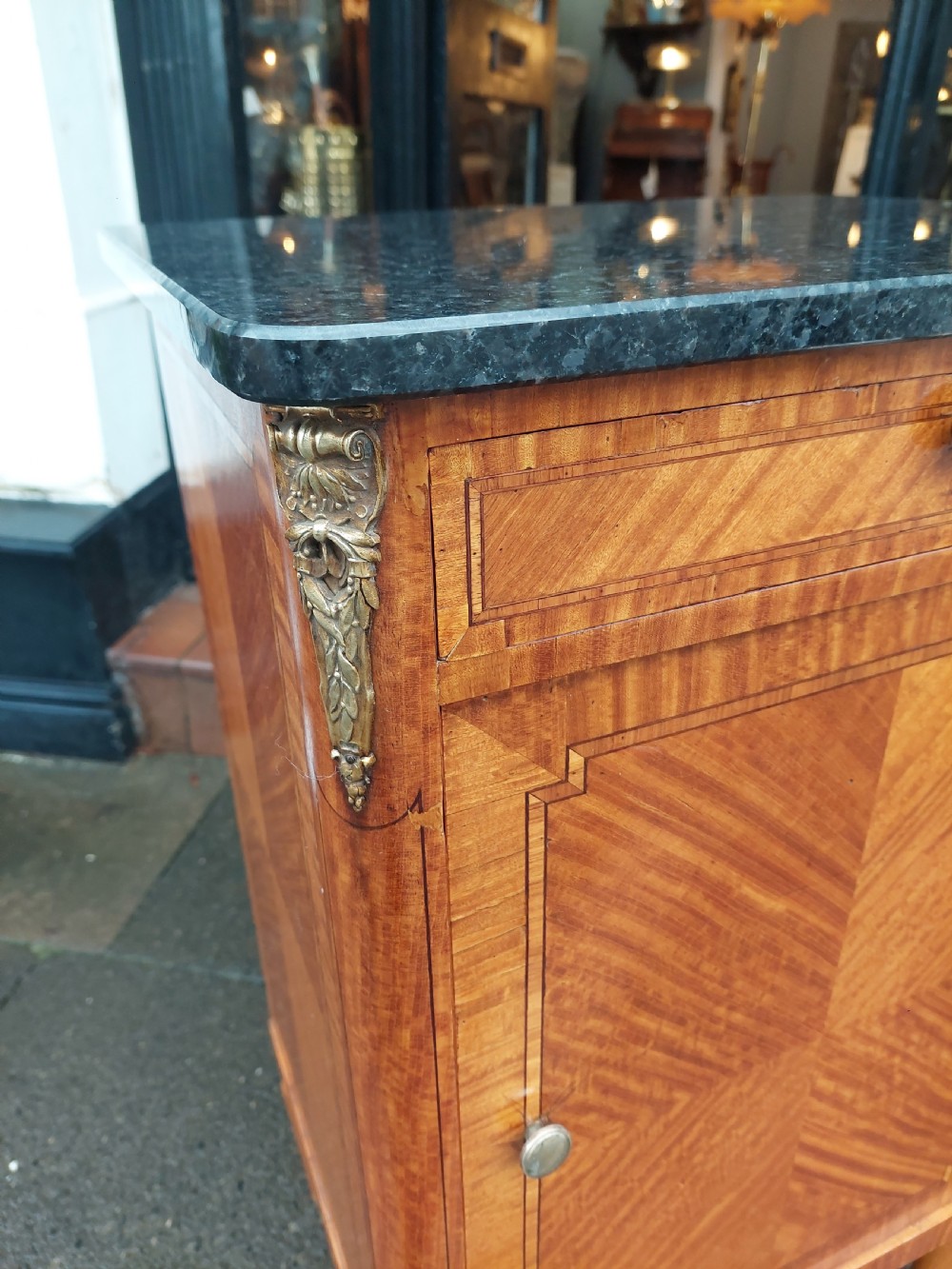 Late 19th-century French pot cupboard with kingwood and satinwood parquetry, dark marble top, single drawer, and tapered turned legs. View IV