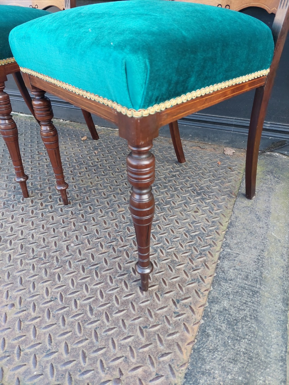 A pair of Edwardian rosewood salon chairs featuring intricate marquetry backrests, turned front legs, and bright teal velvet seat cushions. View II